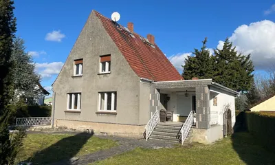 Zu sehen ist, ein Einfamilienhaus des standardisierten Typs EW 58.